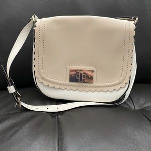 NEW Kate Spade purse. Tan and white. Cute bow interior. Perfect summer bag!